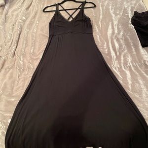 Summer midi dress with built in bra and adjustable straps. Size M color black